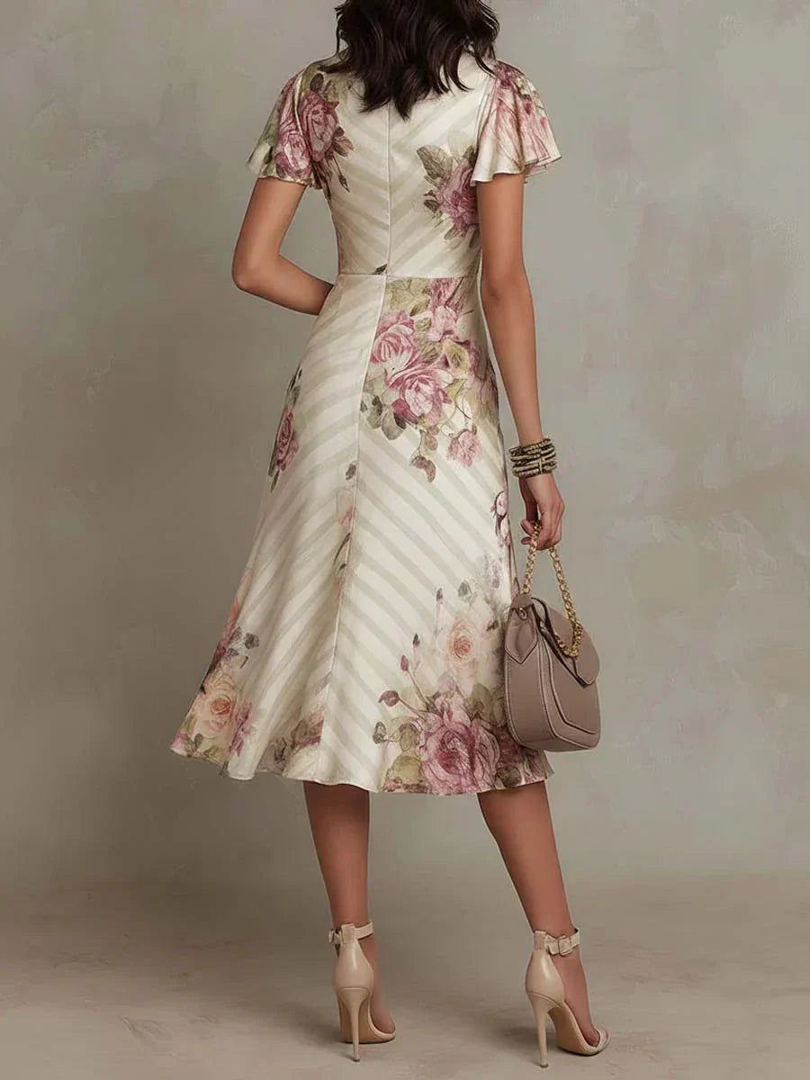 Alba | Elegante vestido midi drapeado con estampado floral