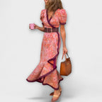 Vestido maxi rosa elegante con mangas cortas