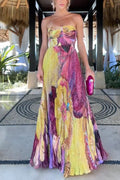 Vestido maxi plisado de tirantes finos con estampado floral y cintura entallada