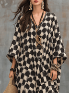 Vestido maxi caftán de inspiración bohemia con lunares y corte holgado