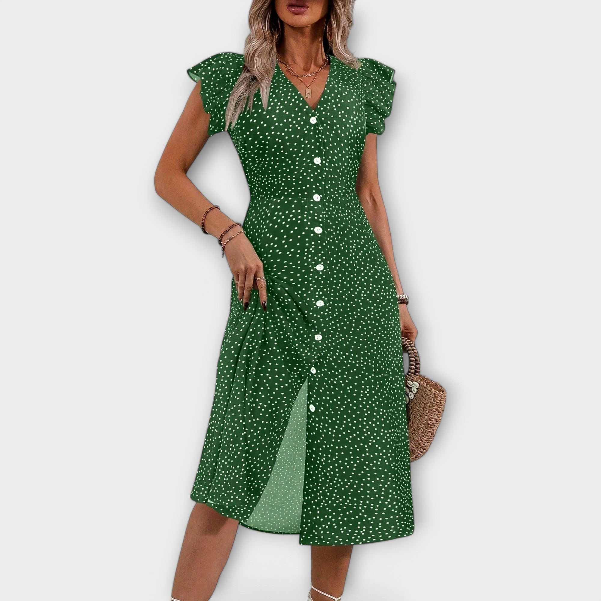 Vestido midi elegante con lunares