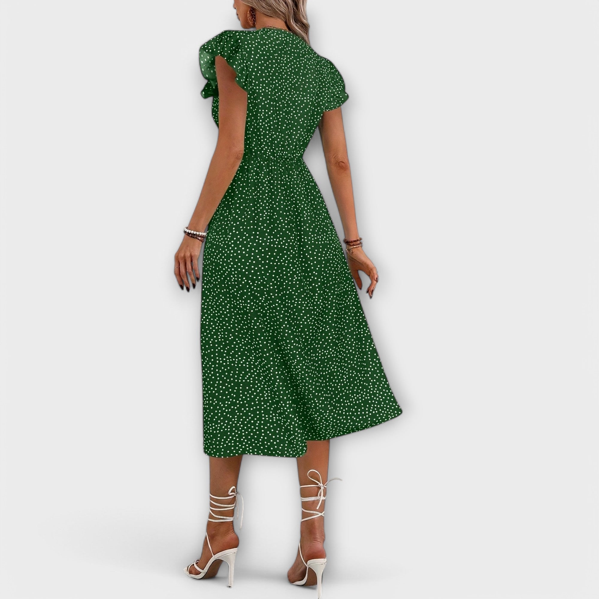 Vestido midi elegante con lunares