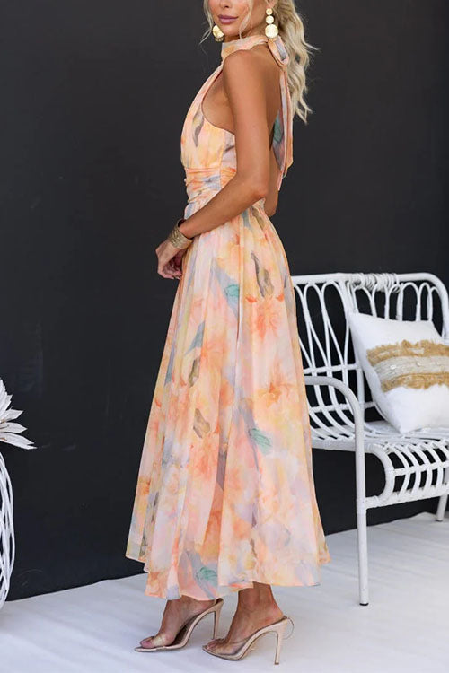 Vestido maxi con escote halter y espalda descubierta, cintura entallada, estampado en acuarela