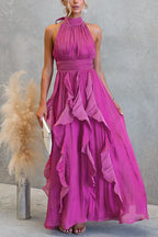 Vestido maxi con escote halter y volantes de caída fluida
