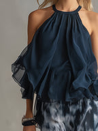 Laura | Top halter elegante azul marino y conjunto de pantalones anchos estampados