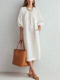 Vestido midi crema de corte relajado
