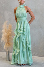 Vestido maxi con escote halter y volantes de caída fluida