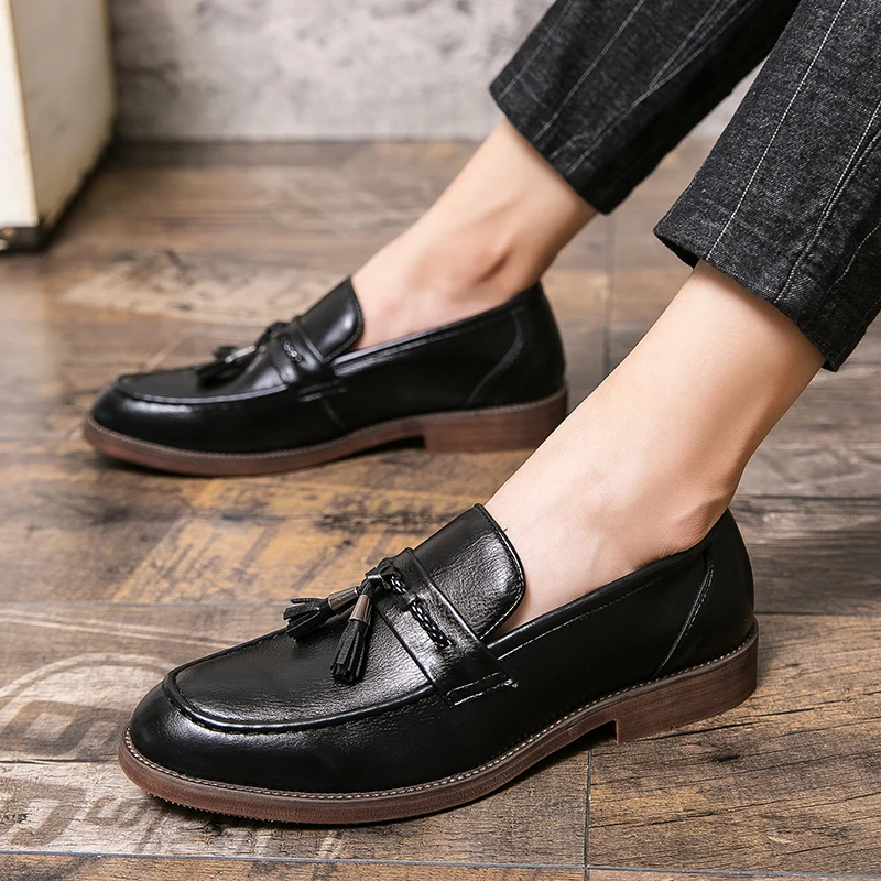 Mocasines de piel con borlas