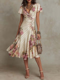 Alba | Elegante vestido midi drapeado con estampado floral