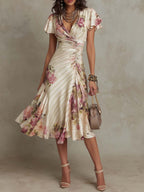 Alba | Elegante vestido midi drapeado con estampado floral