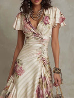 Alba | Elegante vestido midi drapeado con estampado floral