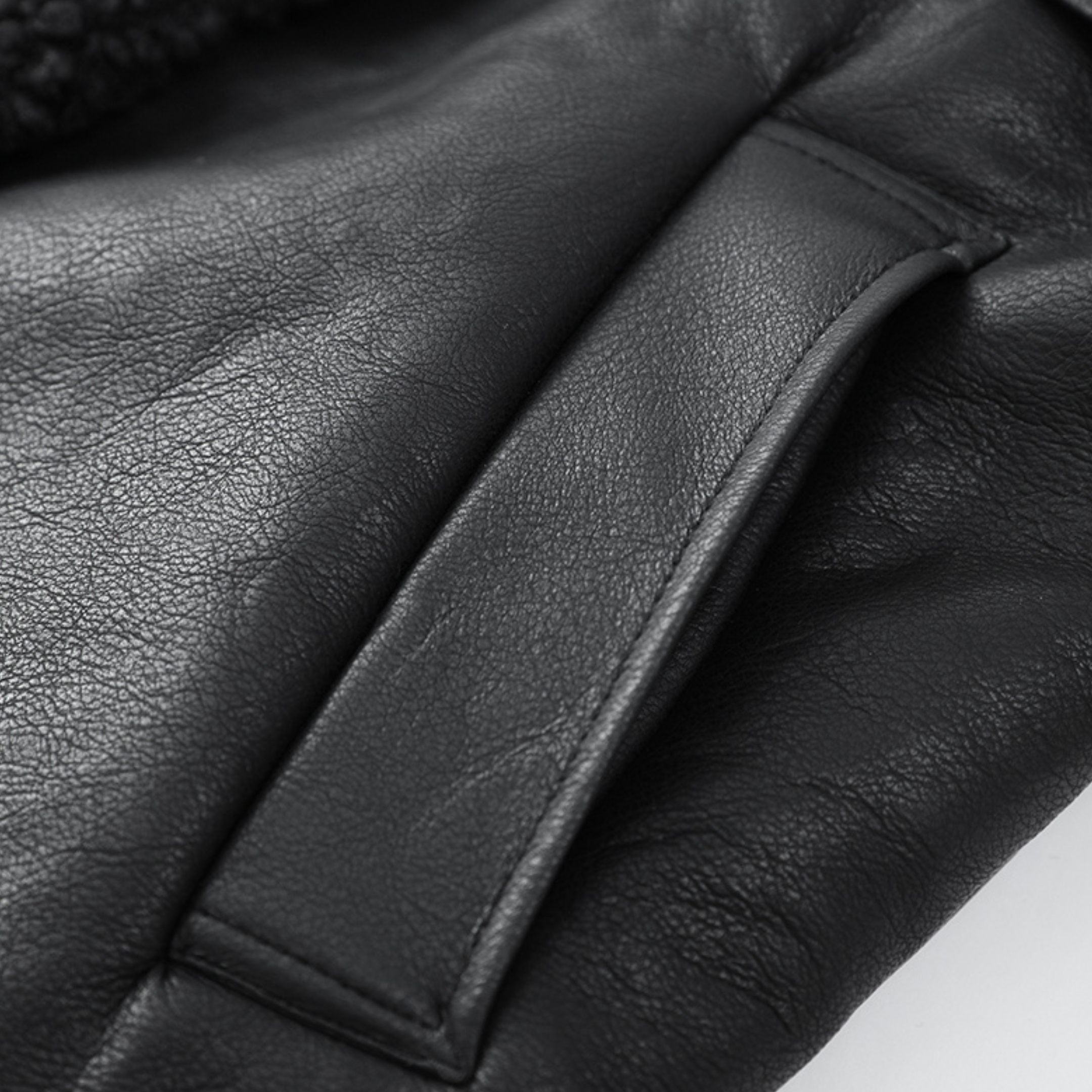 Noelia |  Abrigo de lujo de cuero y lana de cordero con diseño patchwork