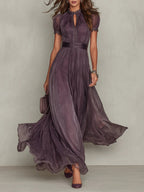 Fabiola | Elegante vestido largo de gasa morada con aberturas