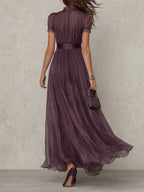 Fabiola | Elegante vestido largo de gasa morada con aberturas