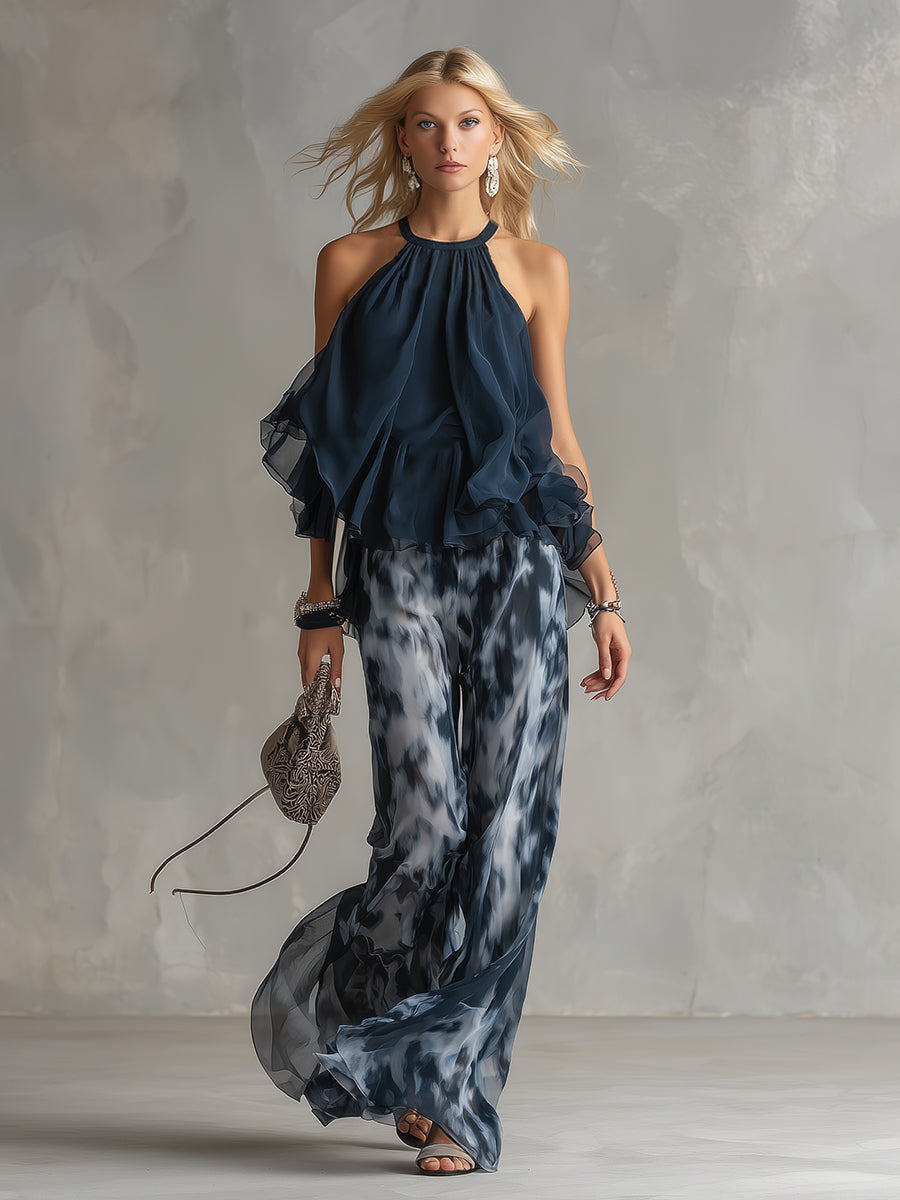Laura | Top halter elegante azul marino y conjunto de pantalones anchos estampados