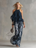 Laura | Top halter elegante azul marino y conjunto de pantalones anchos estampados