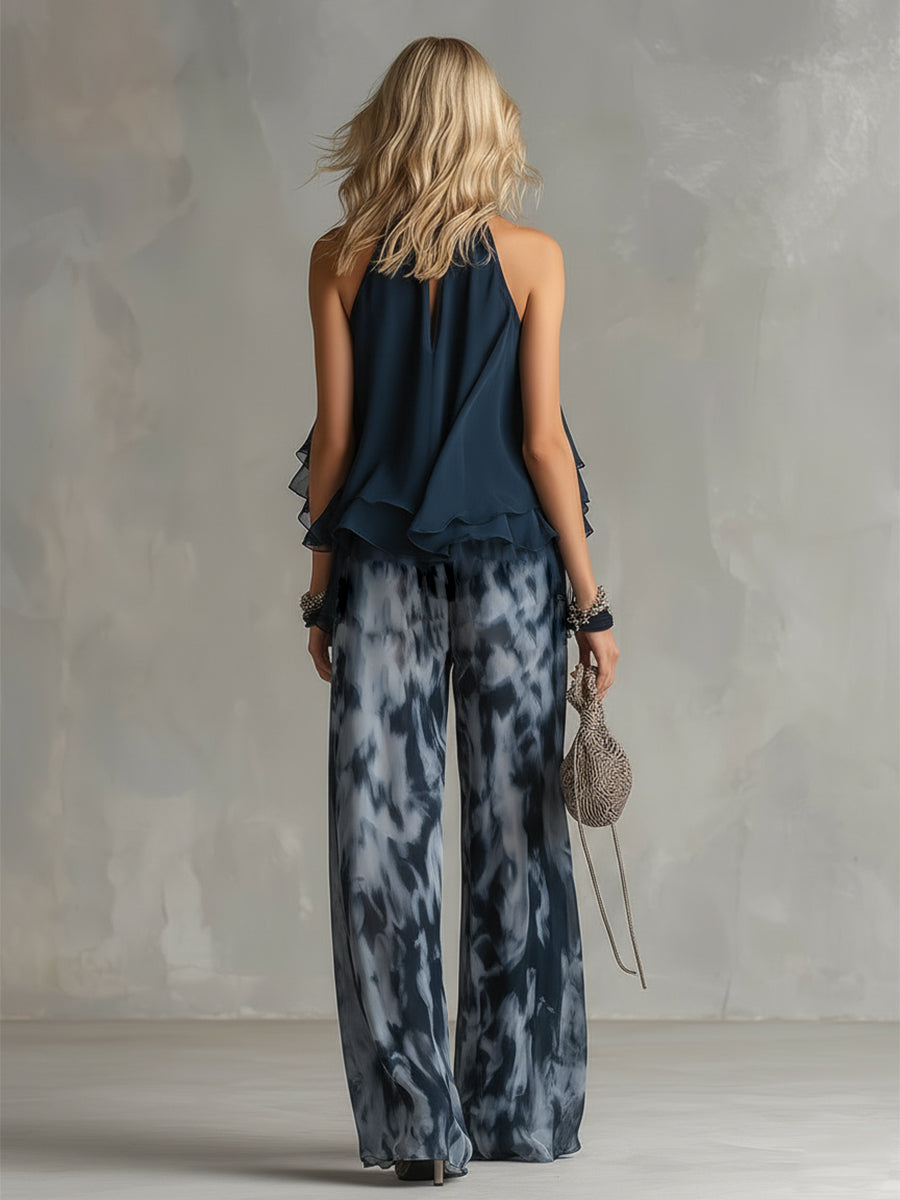 Laura | Top halter elegante azul marino y conjunto de pantalones anchos estampados