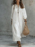 Vestido maxi blanco bohemio con bordado de flores y mangas globo