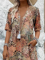 Roxanne™ | Vestido midi envolvente floral vibrante