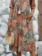 Roxanne™ | Vestido midi envolvente floral vibrante