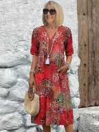 Roxanne™ | Vestido midi envolvente floral vibrante