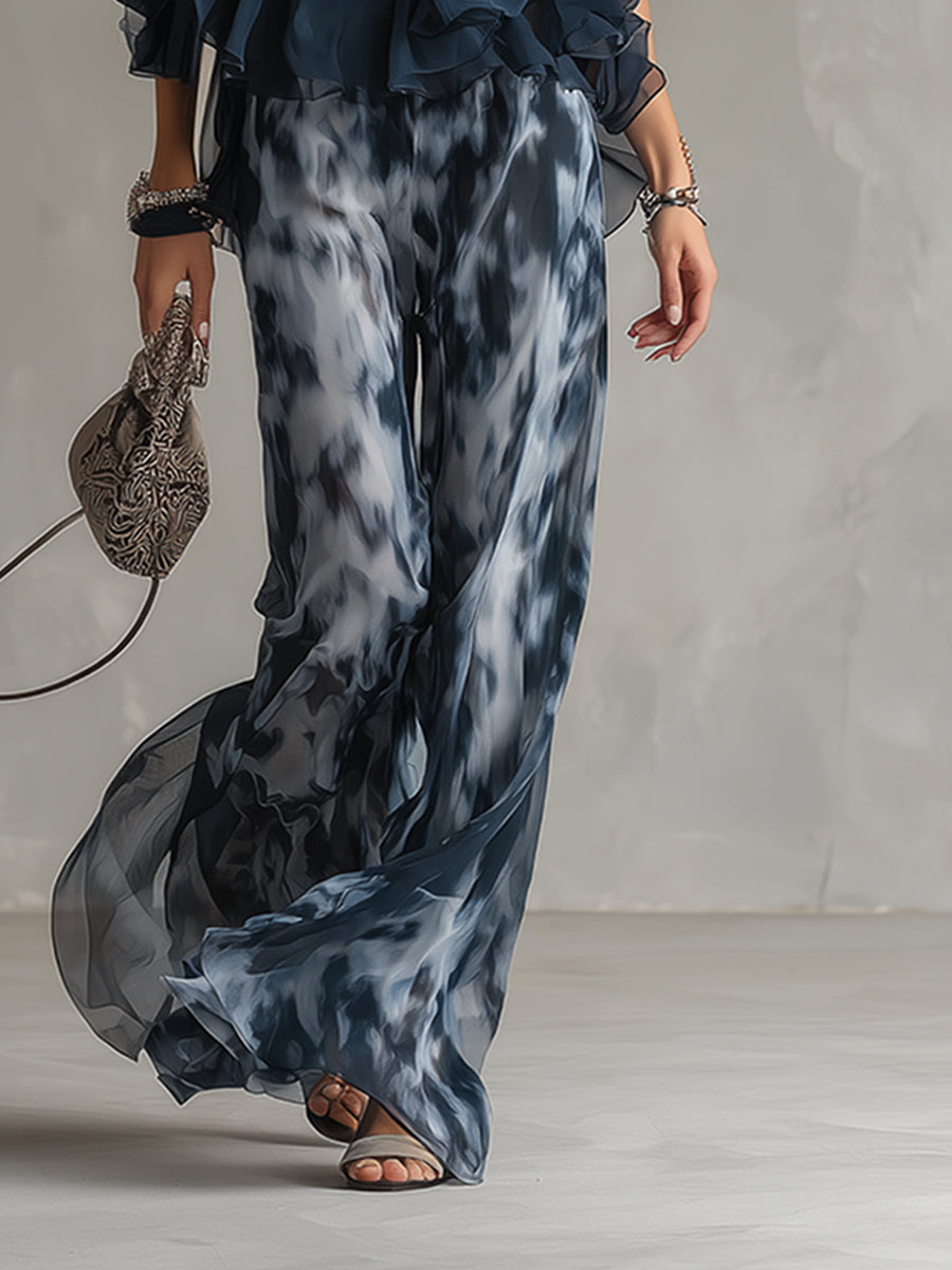 Laura | Top halter elegante azul marino y conjunto de pantalones anchos estampados