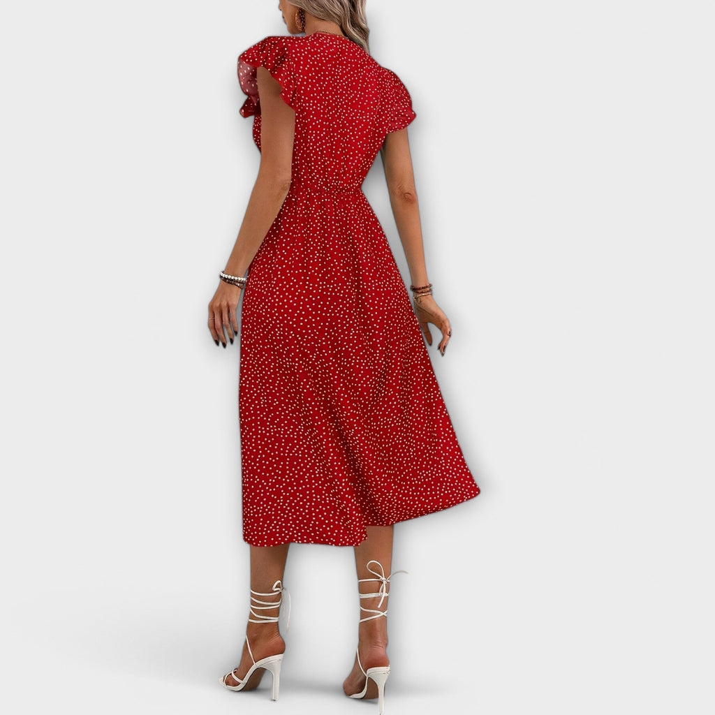 Vestido midi elegante con lunares